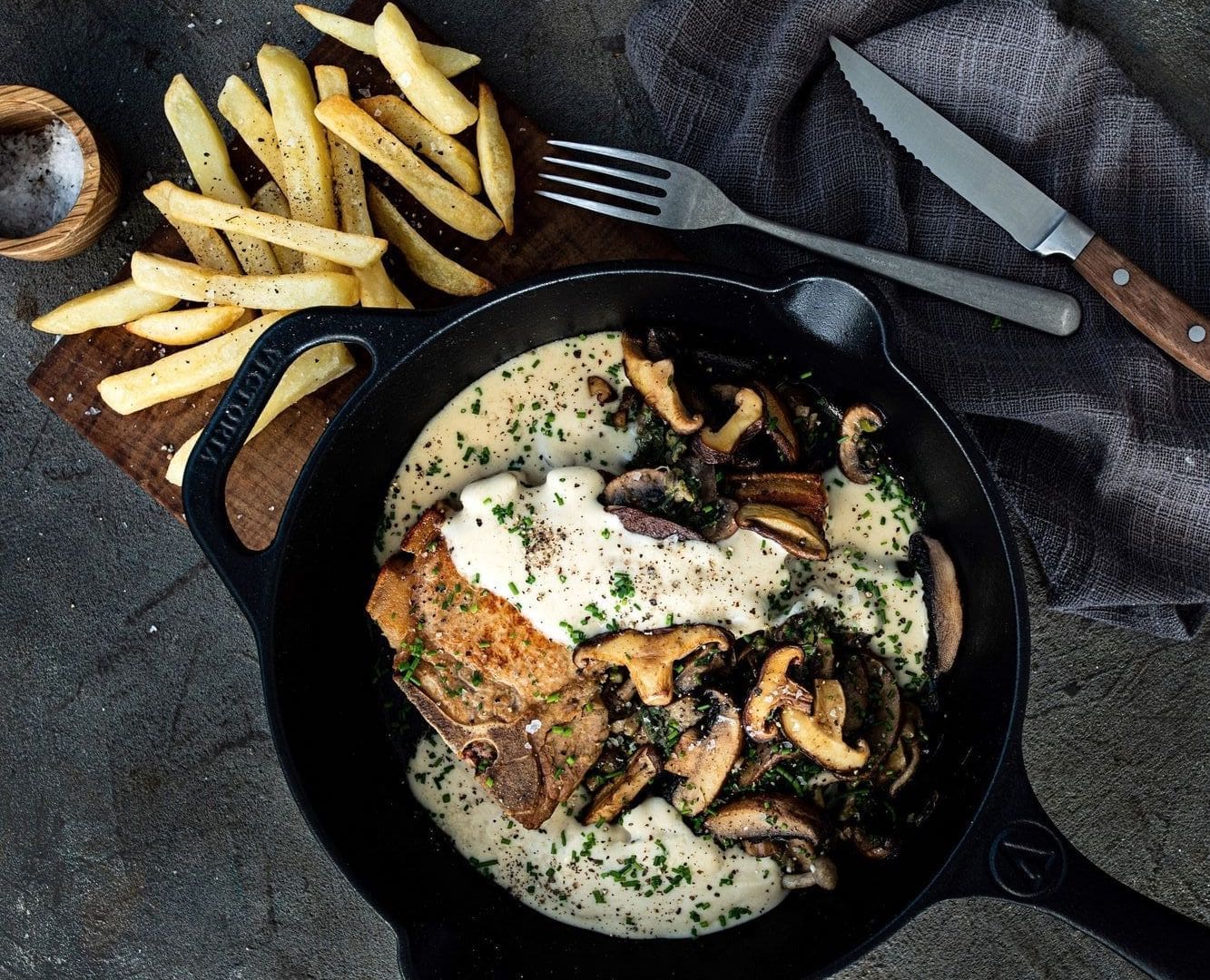 Pork chops smothered in mixed mushrooms